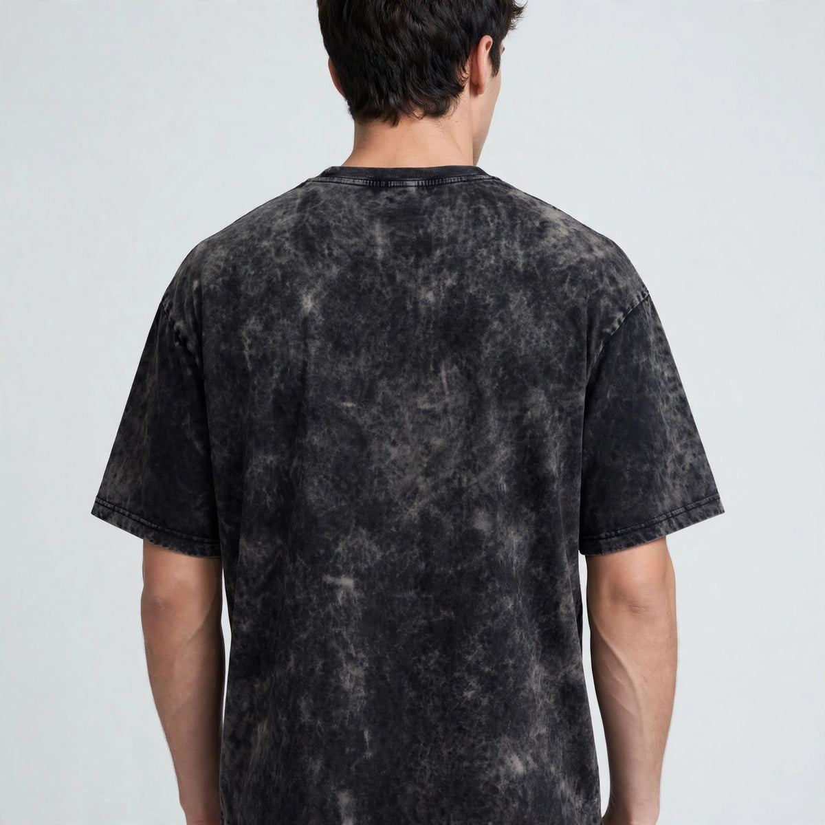 Crimson Gaze Acid Washed Oversized Tee – 200 GSM – worn by male model, back view