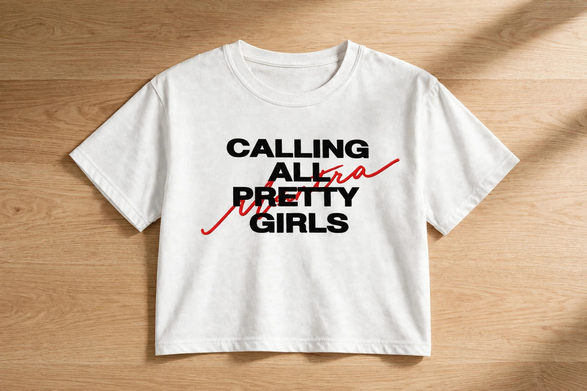 Calling All Pretty Girls Graphic Crop Top – 180 GSM – flat-lay on table