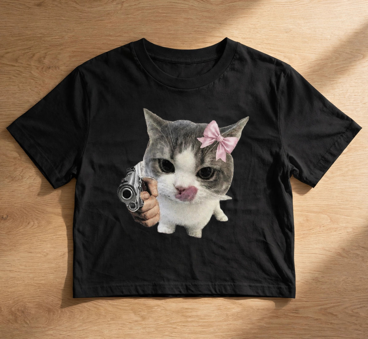 Cat Meme Graphic Crop Top – 180 GSM – flat-lay on table