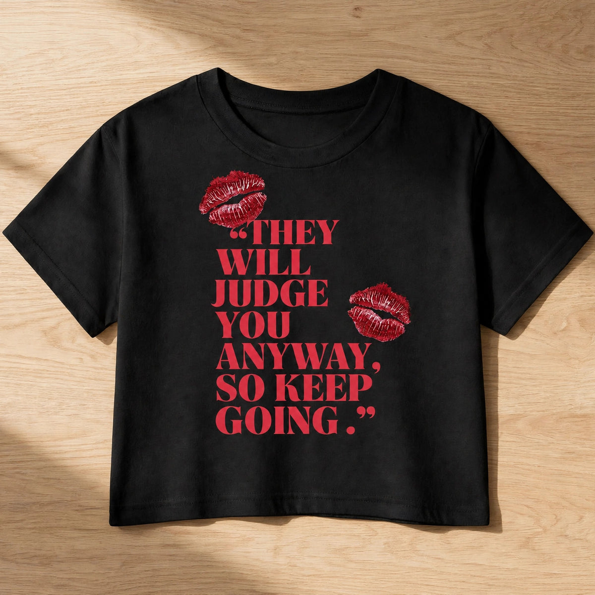 Keep Going Graphic Crop Top – 180 GSM – flat-lay on table