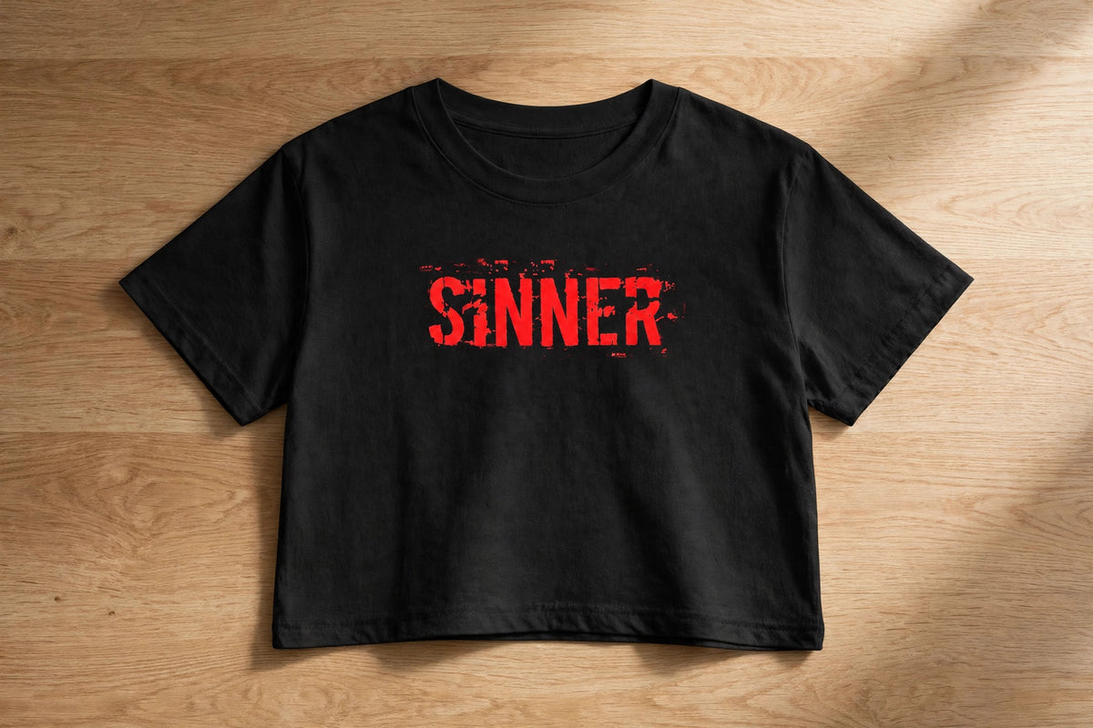 Sinner Graphic Crop Top – 180 GSM – flat-lay on table