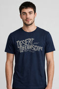 Desert Dreamscape Vintage Tee – Half Sleeve 180 GSM – worn by actor, front view